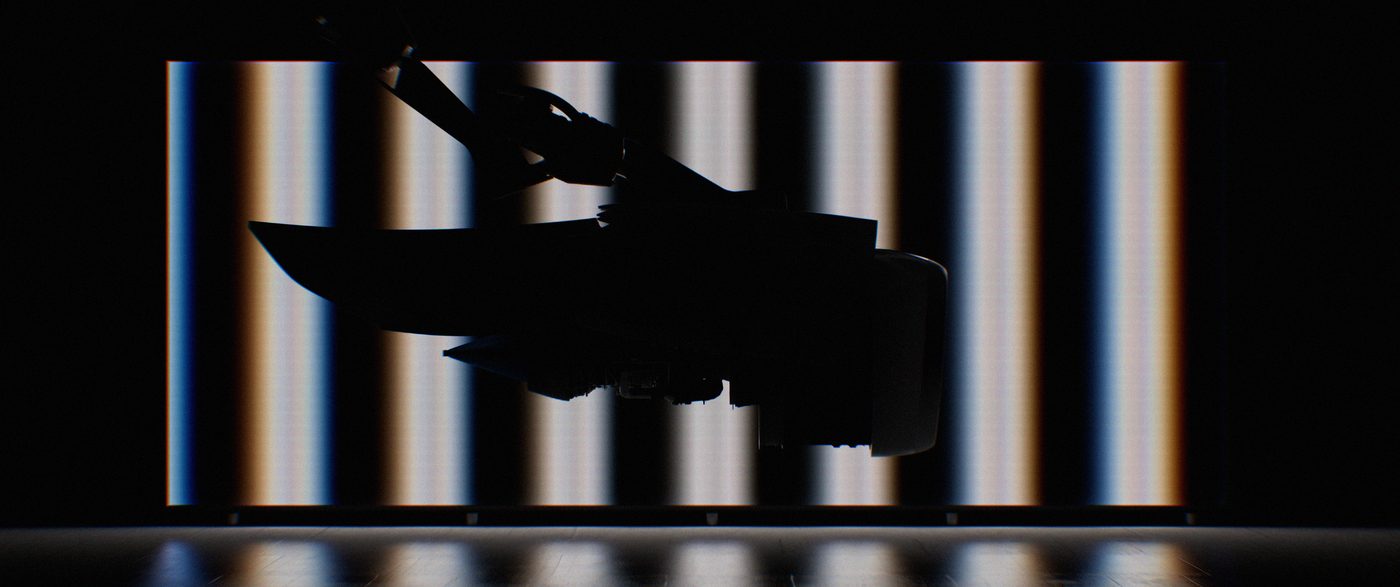 Engine silhouette against vertical stripes