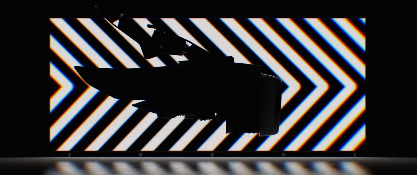 Engine silhouette against chevrons